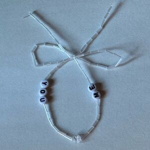 Taylor Swift invisible string bracelet